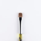 Dual ended Kads manicure brush showing yellow and black handle design