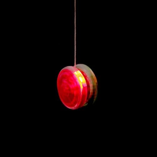 Close up of Bioristar LED yoyo spinning in low light