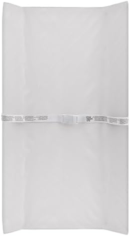Delta Children changing pad showing safety strap and attachment hardware