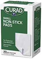 Curad ouchless absorbent dressings box showing product dimensions and sterile packaging details.