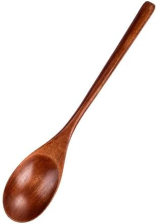 Handcrafted wooden cutlery set on a rustic dining table