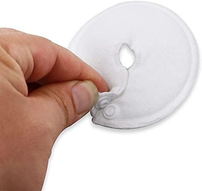 White round absorbent pads for feeding tubes