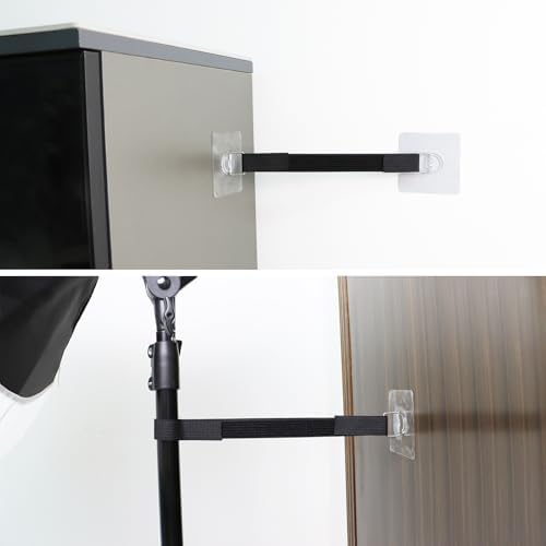 Secured flat screen display showcasing the anti tip protection system attached to a modern wooden console.