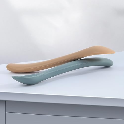 Sterilizing the Eascrozn silicone baby utensils in a pot of safe boiling water.