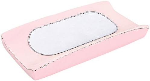 Portable Munchkin waterproof changing liners folded neatly for travel diaper bag storage