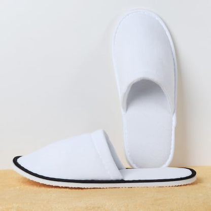 Yeios hotel slippers displayed in their clean individual hygienic packaging