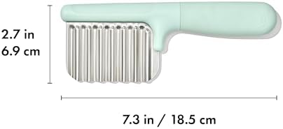 Stainless steel vegetable cutting tool showing side profile and safety handle design