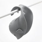 CDKMAX whale shaped baby bath faucet protector installed on a standard bathroom tub tap.