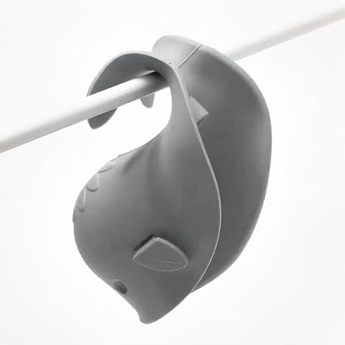 CDKMAX whale shaped baby bath faucet protector installed on a standard bathroom tub tap.