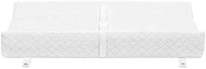 Top view of Babyletto waterproof changing pad on nursery dresser