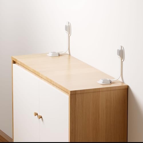 Close up of the heavy duty adjustable nylon strap connecting a dresser to the wall.
