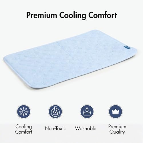 Pet cooling pad for medium dogs spread out flat on a hardwood living room floor