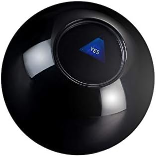 Hand holding Yassk Mystic 8 Ball for size reference