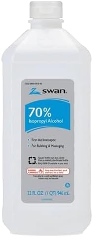Two plastic bottles of Swan rubbing alcohol showing product specifications and volume details.