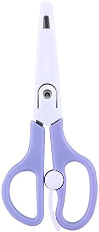 Yinhing safety food scissors packed inside a diaper bag for travel