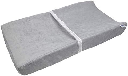 Serta Perfect Sleeper baby changing mattress placed on a standard nursery dresser table.
