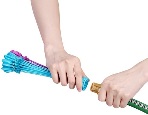 Tropical colored self sealing water balloons filling up simultaneously over water.