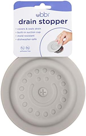 Top view of the Ubbi bath accessory showing the suction cup mechanism