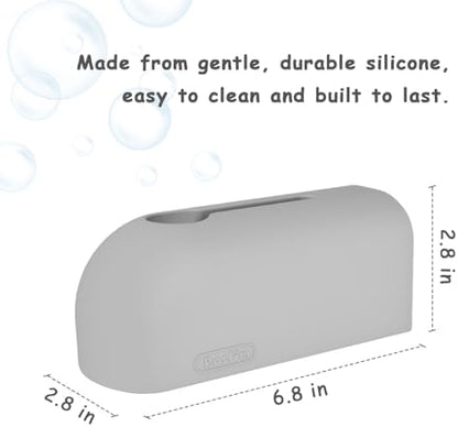 Roslim toddler safety tap cover installed on a bathroom faucet cushioning hard edges