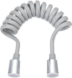 Close up of the chrome finished bidet sprayer nozzle head with press trigger