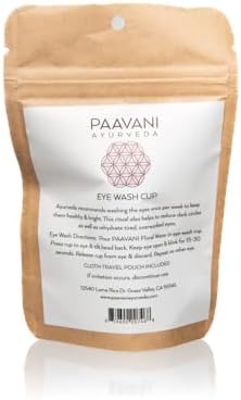 Paavani Ayurveda eye wash cup alongside muslin storage bag for travel.