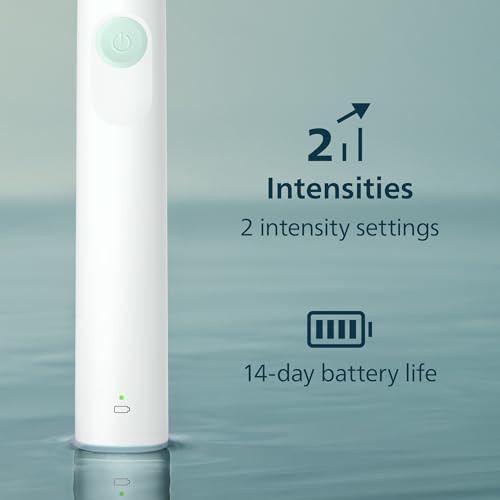 Philips Sonicare electric toothbrush being held to demonstrate the comfortable matte grip and lightweight build.