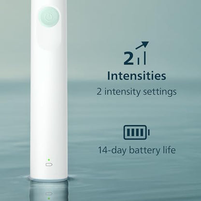 Philips Sonicare electric toothbrush being held to demonstrate the comfortable matte grip and lightweight build.