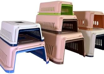 Portable medium dog carrier box optimized for road and air travel comfort.