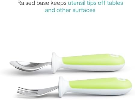 Ergonomic toddler cutlery set on a dining surface