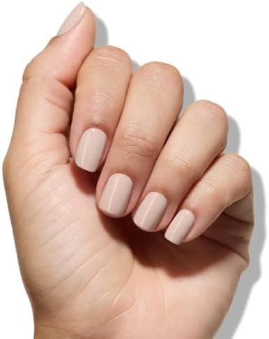 Manicure setup featuring Londontown Kur ridge filler bottle alongside clean natural hands