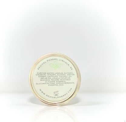 Hand applying Revival Pharms healing cuticle cream