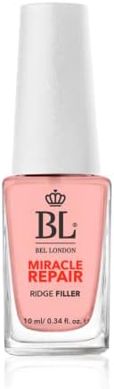 Nutrient enriched nail strengthener bottle showcasing the text details and compact size for travel friendly manicures.