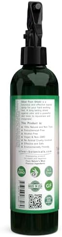 Sanitizing the inside of a running shoe with Silver Botanicals all natural deodorizer spray.