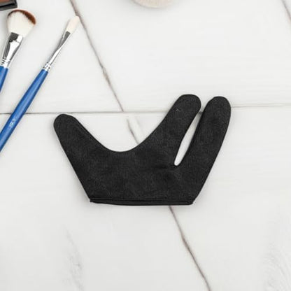 Milaget hairdressing gloves protecting fingers during intricate hair braiding and flat iron work.