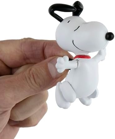 Super Impulse miniature Snoopy happy dance toy showcasing the side mechanical winding key mechanism