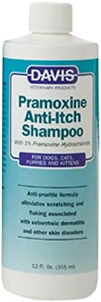 Davis anti-itch dog and cat shampoo bottle next to a measuring cap