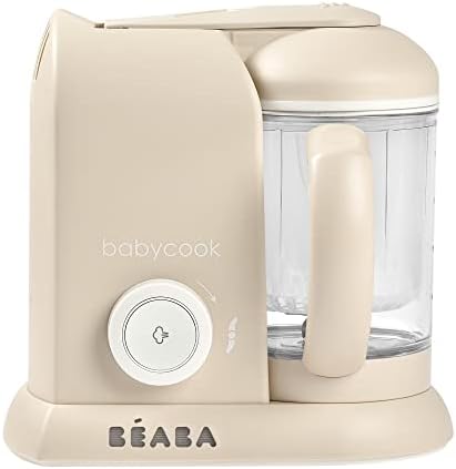 Béaba multi-functional baby food processor steaming fresh vegetables close up view