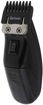 Barbasol electric grooming tool close up on the sharp stainless steel trimmer head for clean detailing.