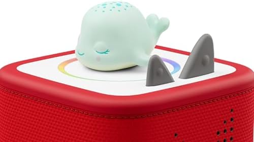 Side profile of Tonies Sleepy Whale audio character on a white background