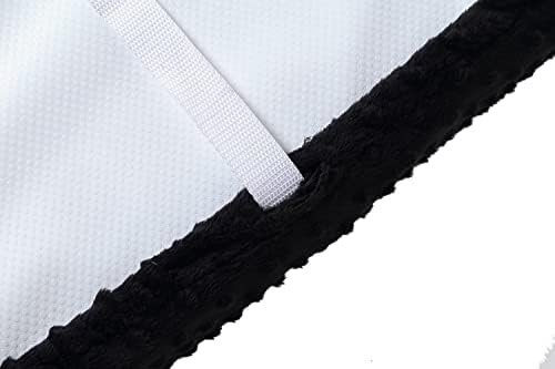Queness Baby diaper changing pad cover stretched neatly over a standard thirty-two by sixteen inch contoured pad.