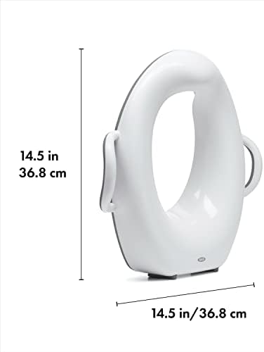 OXO Tot toddler toilet seat in gray highlighting the stable non slip bottom edge