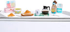 MGA's Miniverse Make It Mini Cafe collectible food items displayed inside the sphere packaging.
