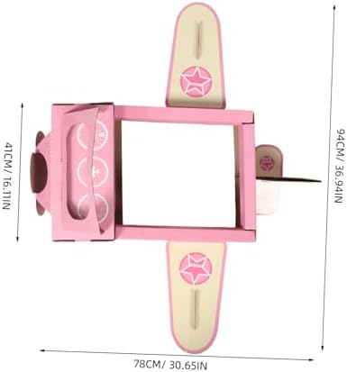 Side view of the children's cardboard aircraft toy highlighting the star insignia and printed dial graphics.