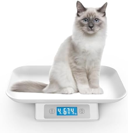 MINDPET-MED small animal weight scale with a newborn puppy resting inside the tray