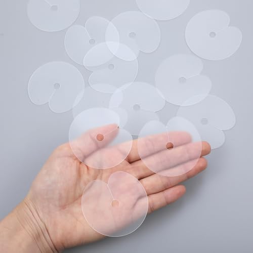 Single hole fusion glue protector spacer discs protecting natural hair strands from hot extension tools.