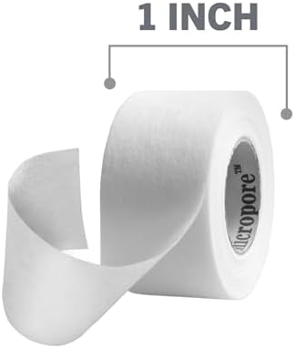 Nexcare first aid paper tape being torn easily by hand.