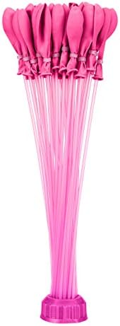 Durable natural rubber pink water balloons splashing in a backyard lawn setting during an outdoor game.