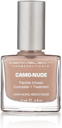 A close-up of the Dermelect Camo-Nude brush application demonstrating full coverage on a natural nail plate.
