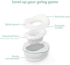 Super absorbent pad inside the Frida Baby leak proof potty liner demonstrating fluid containment
