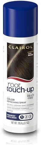 Clairol Root Touch-Up spray application on brown hair roots